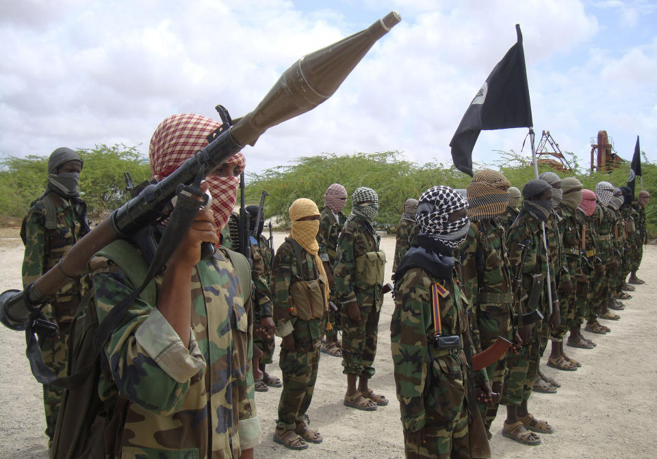 FILE - Al-Shabaab fighters display weapons as they conduct military exercises in northern Mogadishu, Somalia, on Oct. 21, 2010. The United Nations Security Council on Thursday Nov. 9, 2023 suspended for a period of three months the pullout of African Union troop from Somalia, where fighting rages with al-Qaida’s affiliate in East Africa. The decision follows a request by the Horn of Africa nation for the forces to remain in the country to help in the fight against the al-Shabab extremists. (AP Photo/Farah Abdi Warsameh, File)