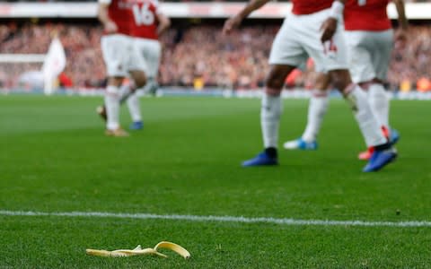 A banana skin was thrown onto the pitch, towards Pierre-Emerick Aubameyang, during last weekend's north London derby - Credit: AFP