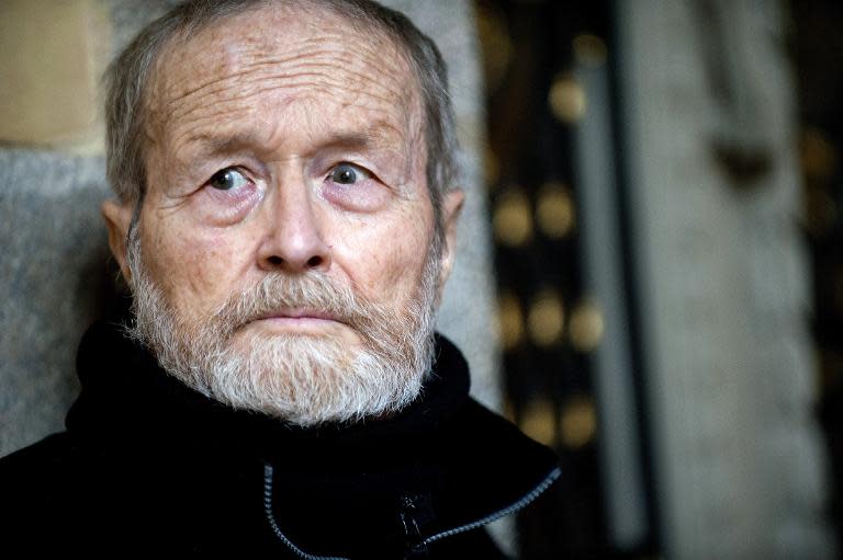 This file picture taken on March 17, 2014, at the court of Rennes, western France, shows Maurice Agnelet arriving to attend a hearing during his third trial for the murder of Agnes Le Roux