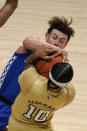 Georgia Tech guard Jose Alvarado, right, and Kentucky guard Devin Askew, left, battle for the ball during the first half of an NCAA college basketball game Sunday, Dec. 6, 2020, in Atlanta. (AP Photo/John Bazemore)