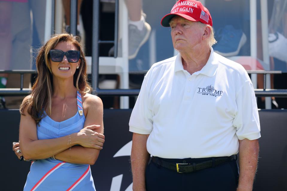 Former President Donald Trump and attorney Alina Habba at the Trump National Golf Club on Sunday.