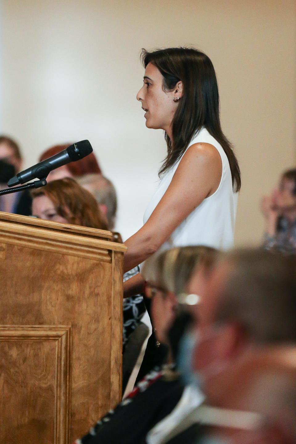 Dr. Ana Espila Navarro explains how vital MetroWest Medical Center's oncology services are to the community during the state Department of Public Health public hearing at Nevins Hall in Framingham, July 6, 2022.