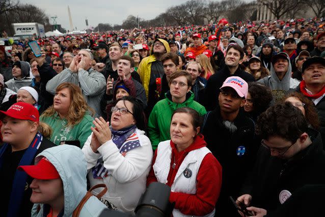 Americans watch on as their new president is sworn in. Source: AP