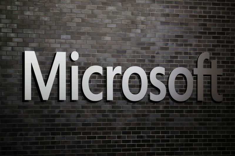 The logo of Microsoft is seen at an office building in Wallisellen