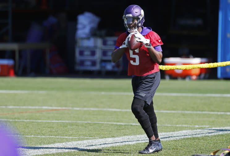 Teddy Bridgewater, shown here in a June minicamp, is still working back from a terrible leg injury. (AP)