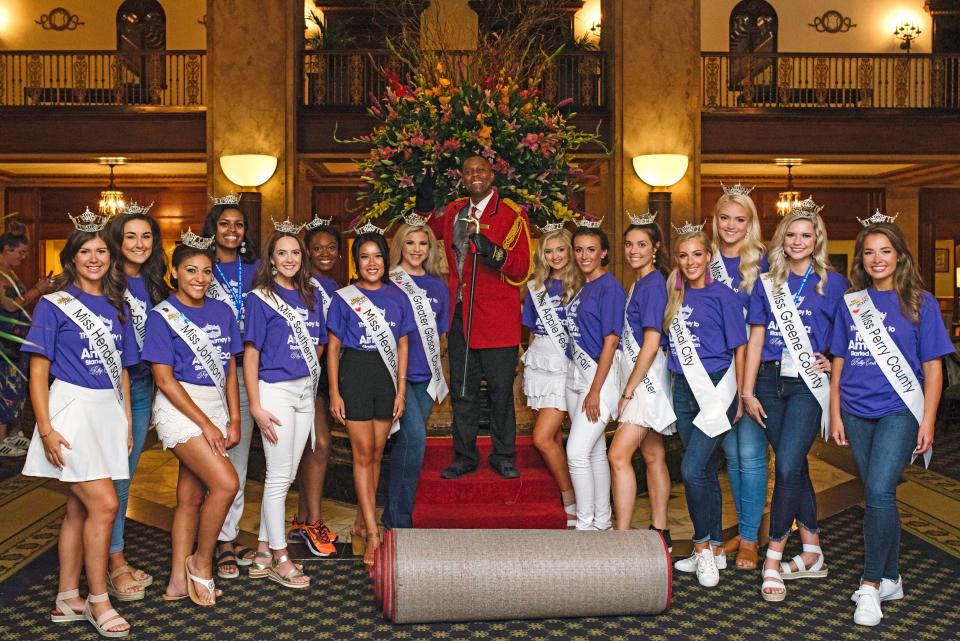 Contestants from Miss Tennessee 2021 pose for a photo with Peabody Duck Master Kenon Walker in Memphis, Tenn., on Thursday, July 1, 2021.