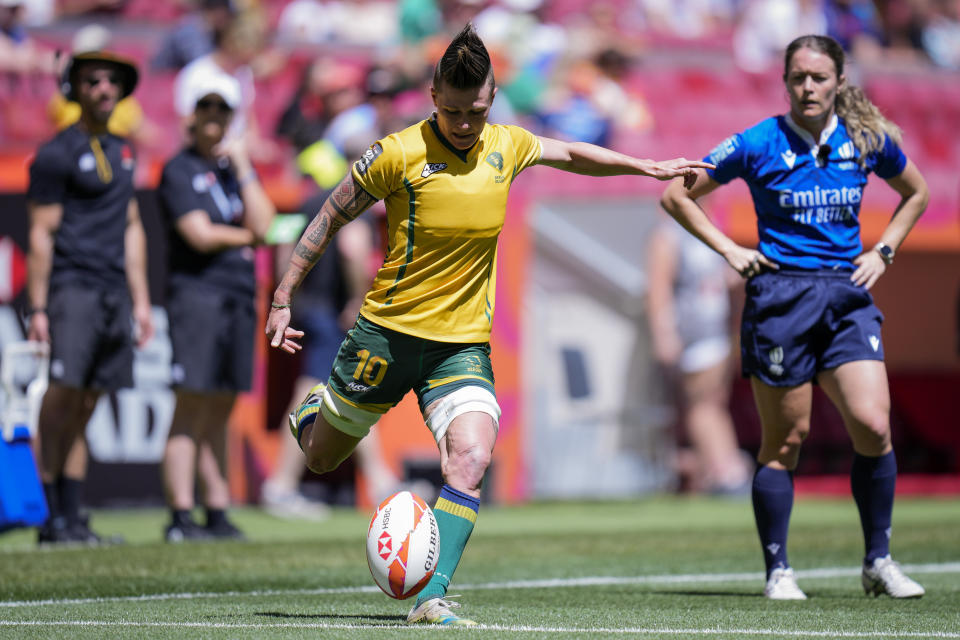 FILE - Raquel Kochhann of Brazil competes during the women's HSBC Rugby Sevens match between Brazil and Belgium in Madrid, Spain, Friday, May 31, 2024. A breast cancer diagnosis, surgery and months of follow-up treatment didn't shake Kochhann's desire to return to rugby sevens and have a shot at a third Olympics. (AP Photo/Bernat Armangue,File)