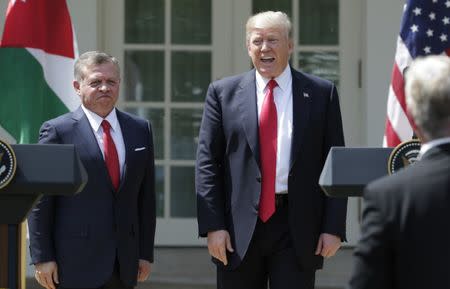 U.S. President Donald Trump (R) and Jordan's King Abdullah stand together at the conclusion of their joint news conference in the Rose Garden after their meeting at the White House in Washington, U.S., April 5, 2017. REUTERS/Yuri Gripas