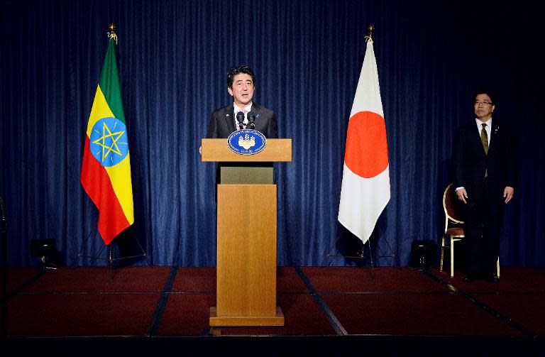 Japanese Prime Minister Shinzo Abe speaks during a press conference in Addis Ababa on January 14, 2014