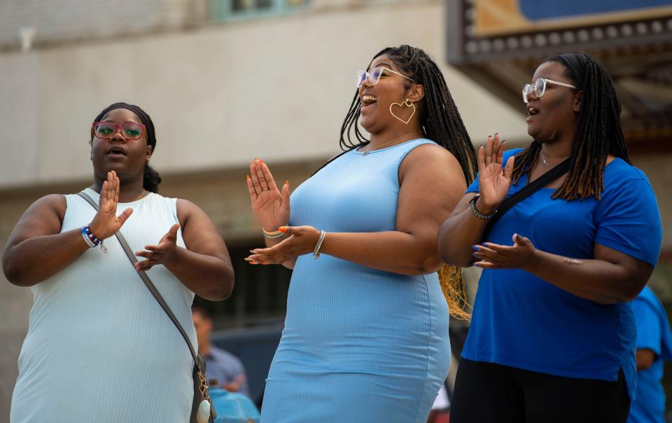 Crystal Hogan, Aundrea Taylor and Philice Hutchen performed with a community choir during the Let's Turn It Around! community prayer on Sunday, June 12, 2022 at Jon R. Hunt Plaza.