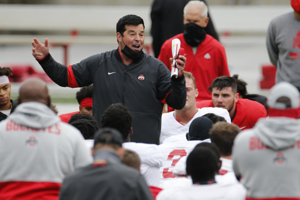 FILE - In this Oct. 3, 2020, file photo, Ohio State head coach Ryan Day talks to his team during their NCAA college football practice in Columbus, Ohio. No. 6 Ohio State has outsized expectations for the 2020 season after coming within one play of advancing to the national championship game last season. (AP Photo/Jay LaPrete, File)