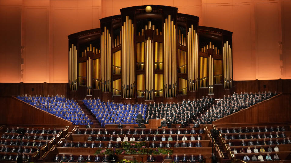 People attend the twice-annual conference of the Church of Jesus Christ of Latter-day Saints Sunday, April 7, 2024, in Salt Lake City. . (AP Photo/Rick Bowmer)