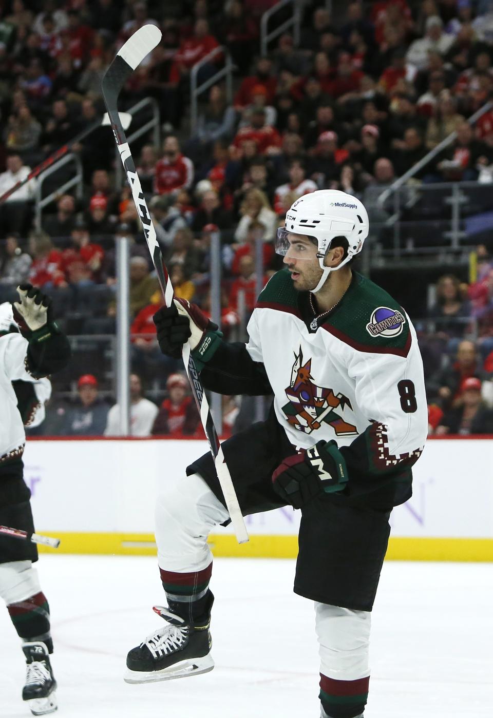 Arizona Coyotes center Nick Schmaltz (8) celebrates his second-period goal against the Detroit Red Wings during an NHL hockey game Friday, Nov. 25, 2022, in Detroit. (AP Photo/Duane Burleson)