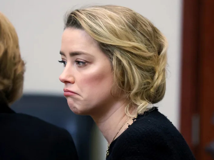 amber heard frown johnny depp trial