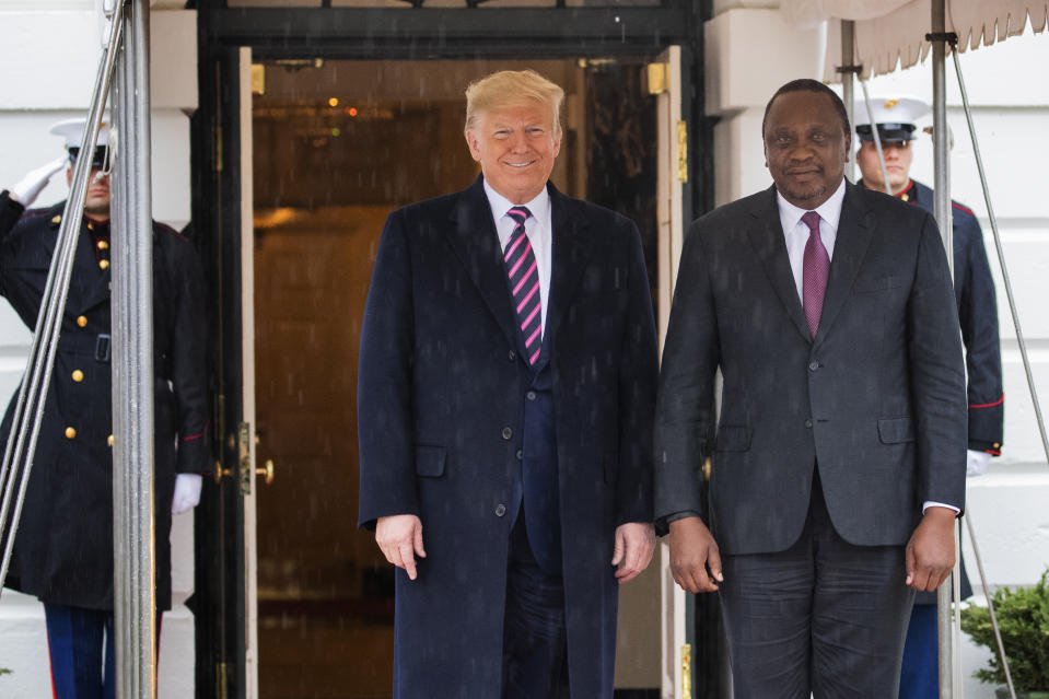 President Donald Trump welcomes Kenyan President Uhuru Kenyatta at the White House, Thursday, Feb. 6, 2020, in Washington. (AP Photo/Manuel Balce Ceneta)