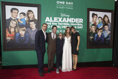 Cast members (from L-R) Steve Carell, Dylan Minnette, Ed Oxenbould, Kerris Dorsey and Jennifer Garner pose at the premiere of "Alexander and the Terrible, Horrible, No Good, Very Bad Day" at El Capitan theatre in Hollywood, California October 6, 2014. REUTERS/Mario Anzuoni