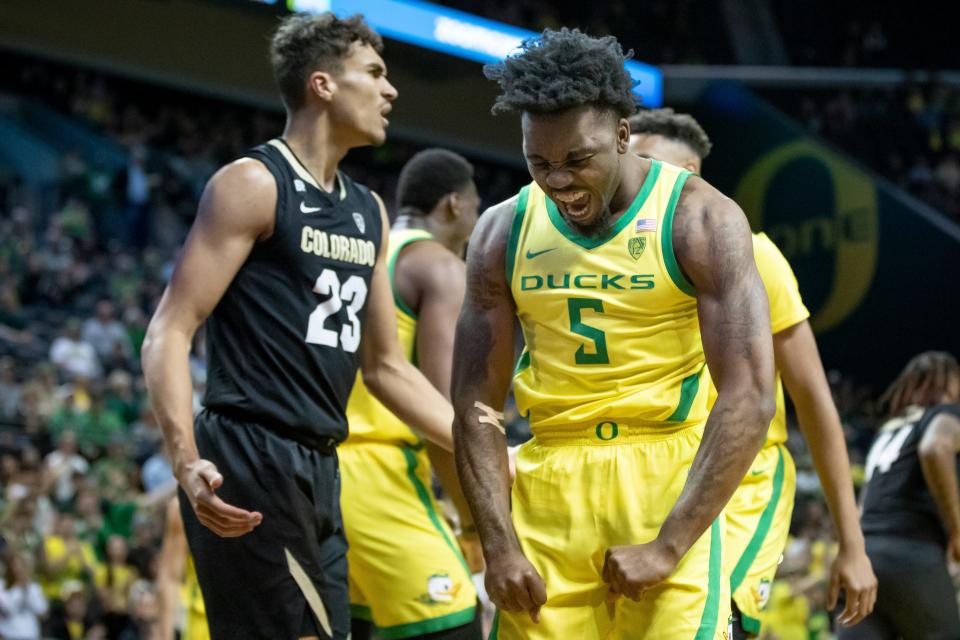 Oregon guard Jermaine Couisnard celebrates during the first half as the Oregon Ducks host the Colorado Buffaloes Thursday, March 7, 2024 at Matthew Knight Arena in Eugene, Ore.