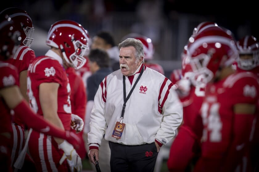 Mission Viejo, CA - December 11: Mater Dei coach Bruce Rollinson coaches the game as they beat San Mateo Serra 44-7 to win the 2021 CIF State Football Championship Bowl Games Open Division tournament at Saddleback College, Mission Viejo, CA on Saturday, Dec. 11, 2021. (Allen J. Schaben / Los Angeles Times)