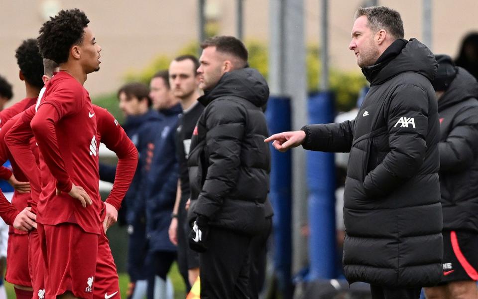 Alex Inglethorpe relays instructions to Liverpool player Ranel Young