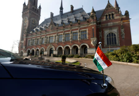 A car with the Indian flag is parked outside the International Court of Justice during the final hearing of the Kulbhushan Jadhav case in The Hague, the Netherlands, February 18, 2019. REUTERS/Eva Plevier