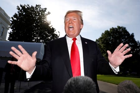 U.S. President Trump speaks to reporters as he departs for travel to Colorado from the White House in Washington