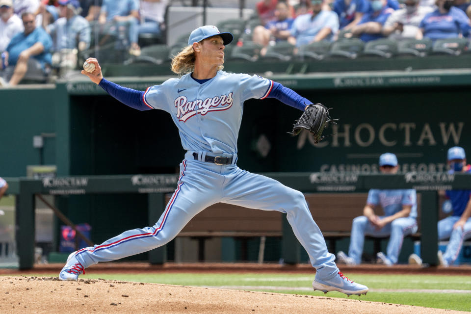 Texas Rangers starting pitcher Mike Foltynewicz works against the Boston Red Sox during the first inning of a baseball game Sunday, May 2, 2021, in Arlington, Texas. (AP Photo/Jeffrey McWhorter)