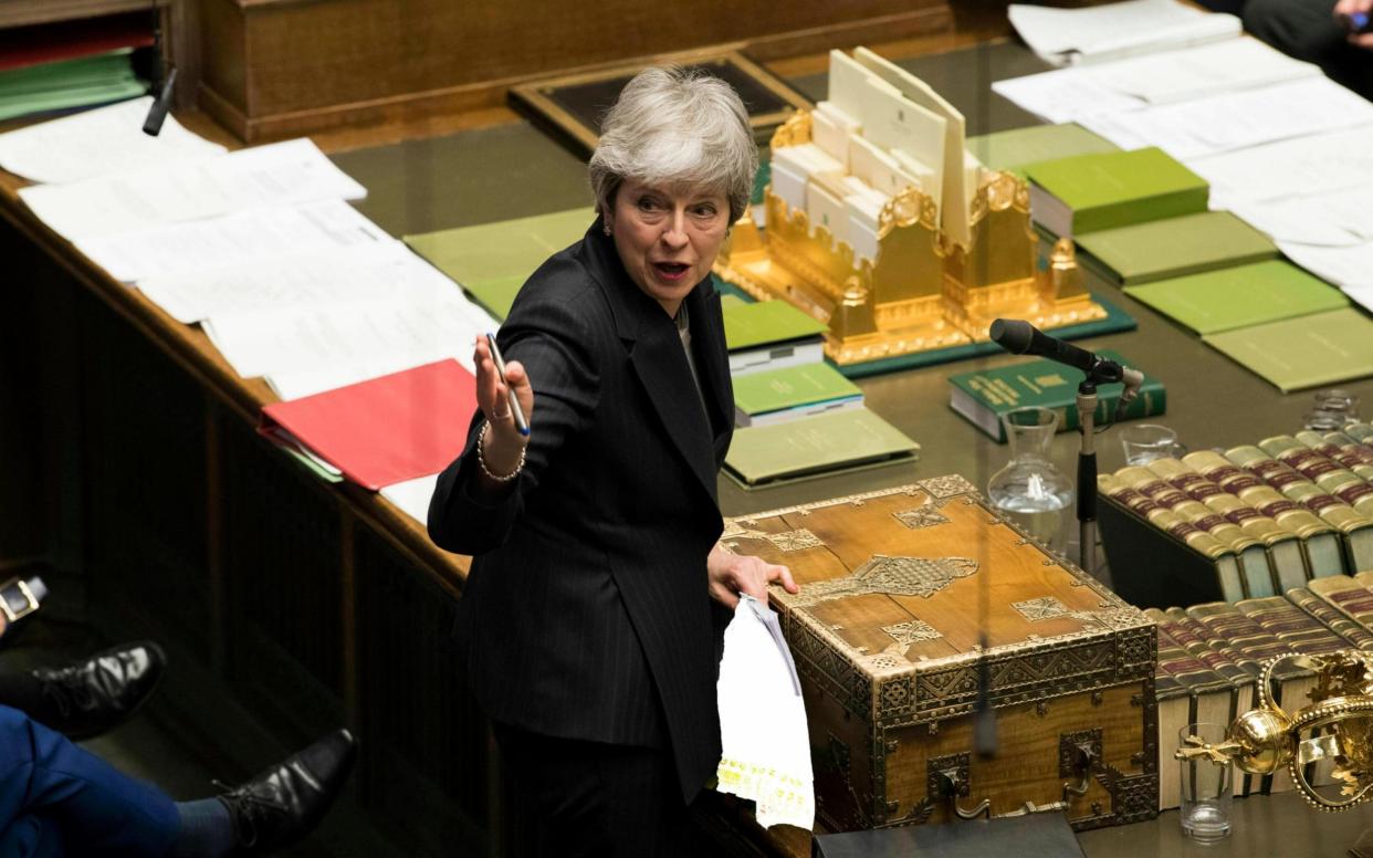 Prime Minister Theresa May speaks during Prime Minister's Questions in the House of Commons - UK Parliament/Mark Duffy