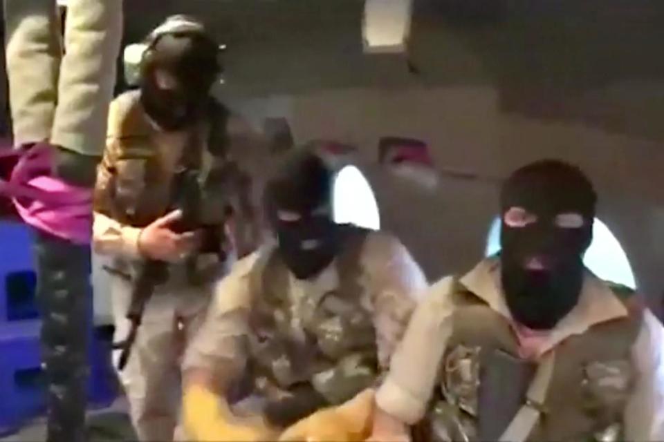 Iranian troops pictured in a propaganda video released showing them storming the tanker (REUTERS)