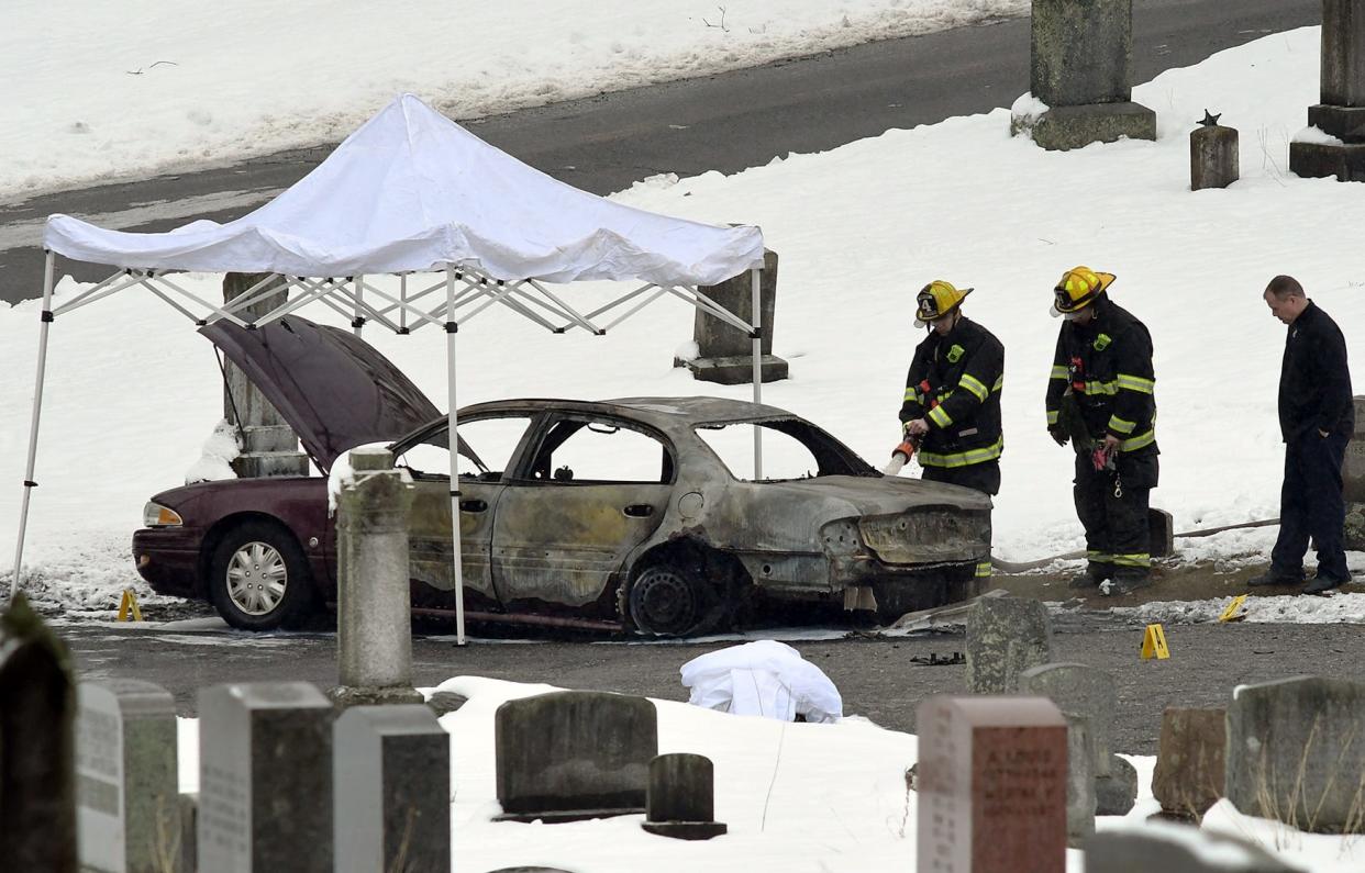 Firefighters were called to Hope Cemetery Dec. 12, 2017, after a body was found in a burning car.