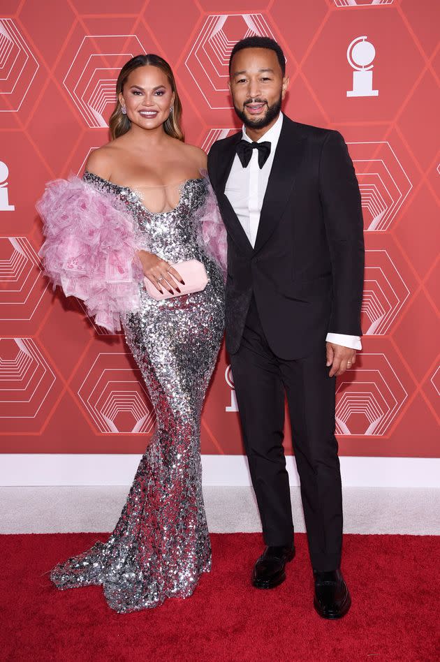 Chrissy Teigen, left, and John Legend arrive at the 74th annual Tony Awards at Winter Garden Theatre on Sunday, Sept. 26, 2021, in New York. (Photo by Evan Agostini/Invision/AP) (Photo: via Associated Press)