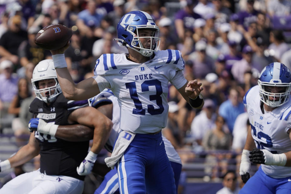 Duke quarterback Riley Leonard (13) looks to pass against Northwestern during the first half of an NCAA college football game, Saturday, Sept.10, 2022, in Evanston, Ill. (AP Photo/David Banks)