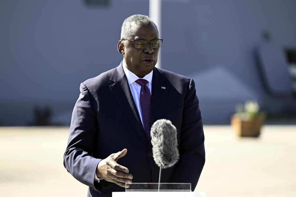 U.S. Defense Secretary Lloyd Austin and Sweden's Defense Minister Pal Jonson, unseen, speak at the Muskö Naval Base, in Stockholm, Sweden, Wednesday, April 19, 2023. (Fredrik Sandberg/TT News Agency via AP)