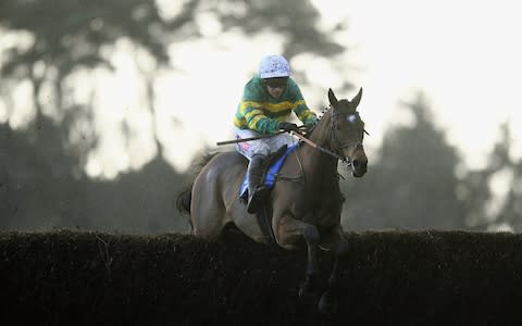 Defi Du Seuil ridden by Barry Geraghty jump the last on their way to winning the Heavitree Brewery PLC Novices Chase at Exeter Racecourse on December 7, 2018 in Exeter, England - Credit: Harry Trump/Getty Images