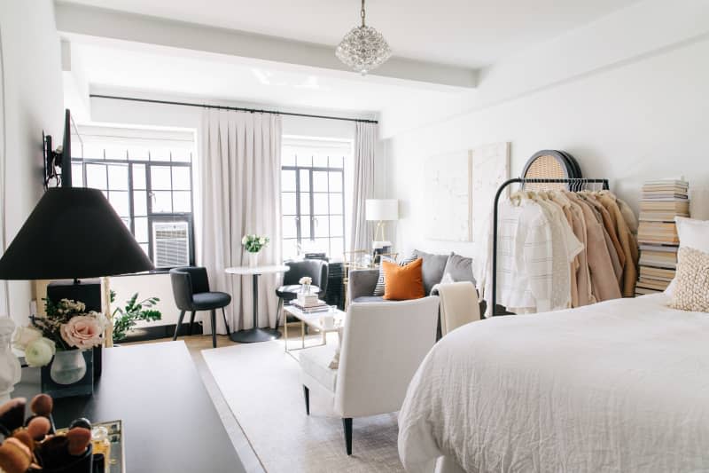 living room features floor to ceiling curtains