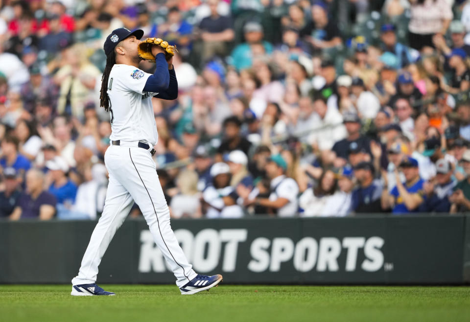 Seattle Mariners starting pitcher Luis Castillo walks off the field after the third inning of a baseball game against the Washington Nationals, Monday, June 26, 2023, in Seattle. (AP Photo/Lindsey Wasson)