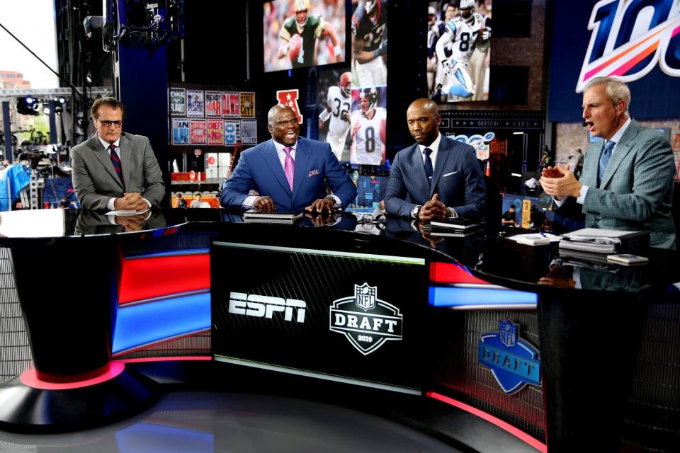 Mel Kiper Jr., Booger McFarland, Louis Riddick, and Trey Wingo. (AP Photo/Steve Luciano)