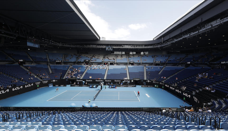 United States' Serena Williams, right, serves to Russia's Anastasia Potapova during their third round match on Rod Laver Arena at the Australian Open tennis championship in Melbourne, Australia, Friday, Feb. 12, 2021.(AP Photo/Rick Rycroft)