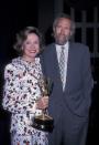 <p><em>Muppets</em> puppeteer Jim Henson and show producer Joan Ganz strike a pose at the Emmy ceremony held at the Waldorf Hotel in New York City.</p>