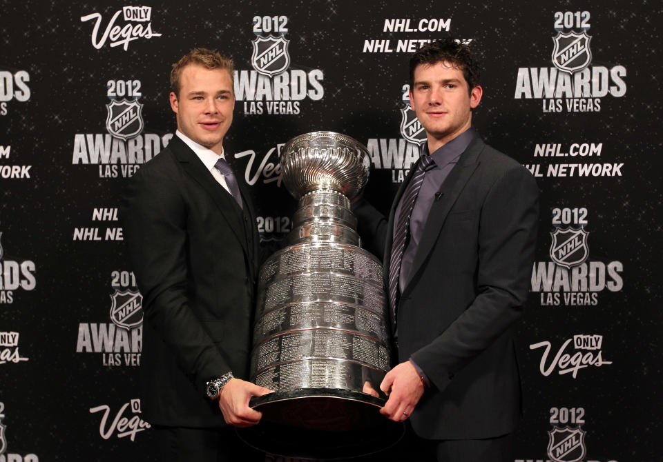 LAS VEGAS, NV - JUNE 20: Dustin Brown and Jonathan Quick of the Los Angeles Kings pose with the Stanley Cup as he arrives before the 2012 NHL Awards at the Encore Theater at the Wynn Las Vegas on June 20, 2012 in Las Vegas, Nevada. (Photo by Bruce Bennett/Getty Images)