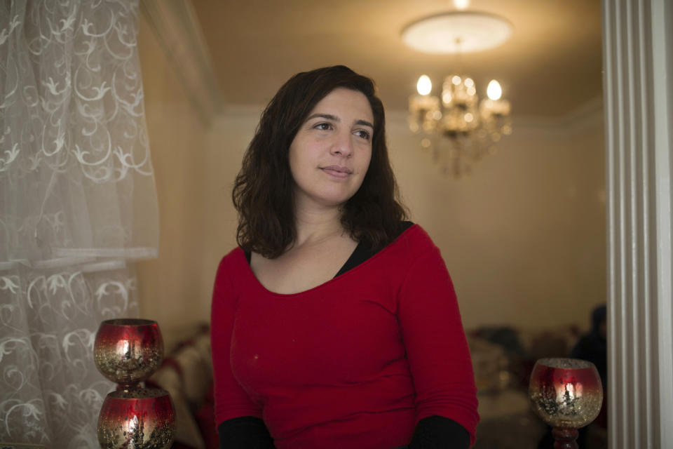 In this photo taken on Saturday, Feb. 16, 2019, Sara Soujar, 30, activist, poses for a portrait during an interview with Associated Press, in Casablanca, Morocco. Several demonstrations were held Wednesday, Feb. 20, exactly eight years after the birth of a Moroccan Arab Spring protest movement that awakened a spirit of activism in this North African kingdom. Teachers’ unions held a protest Wednesday outside the Education Ministry in Rabat, and police charge them and beat some to the ground. (AP Photo/Mosa'ab Elshamy)