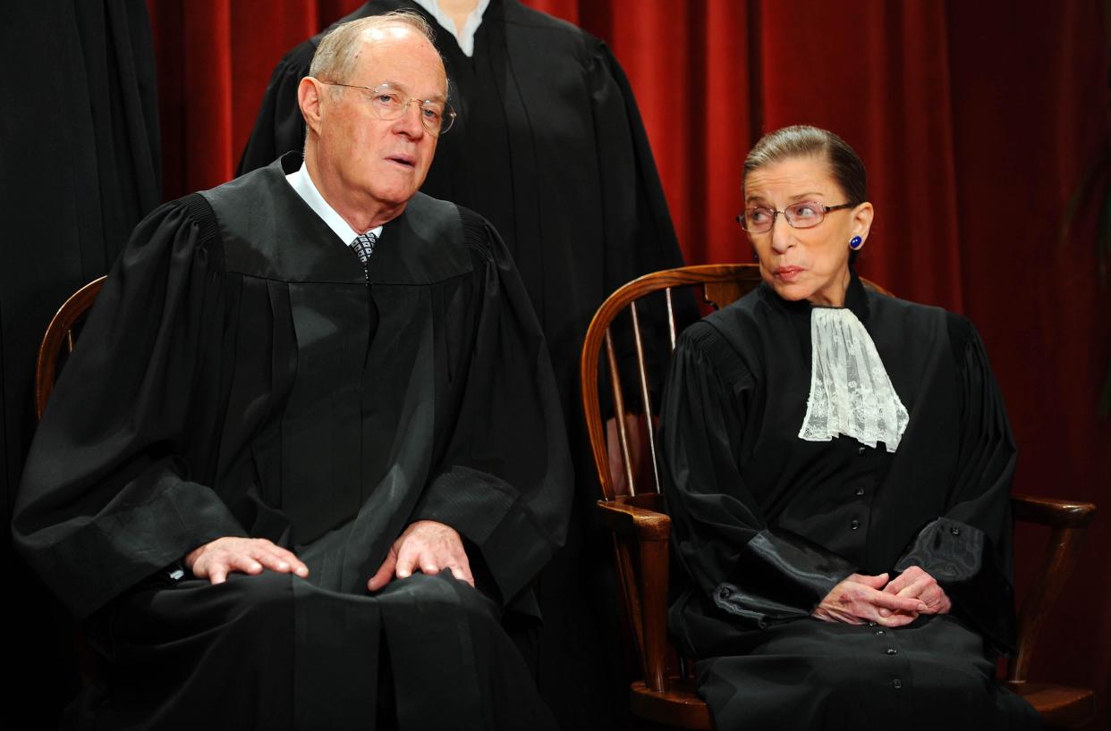 U.S. Supreme Court Associate Justice Anthony M. Kennedy (L) and Associate Justice Ruth Bader Ginsburg participate in the courts official photo session on October 8, 2010 at the Supreme Court in Washington, DC. / Credit: TIM SLOAN/AFP/Getty Images