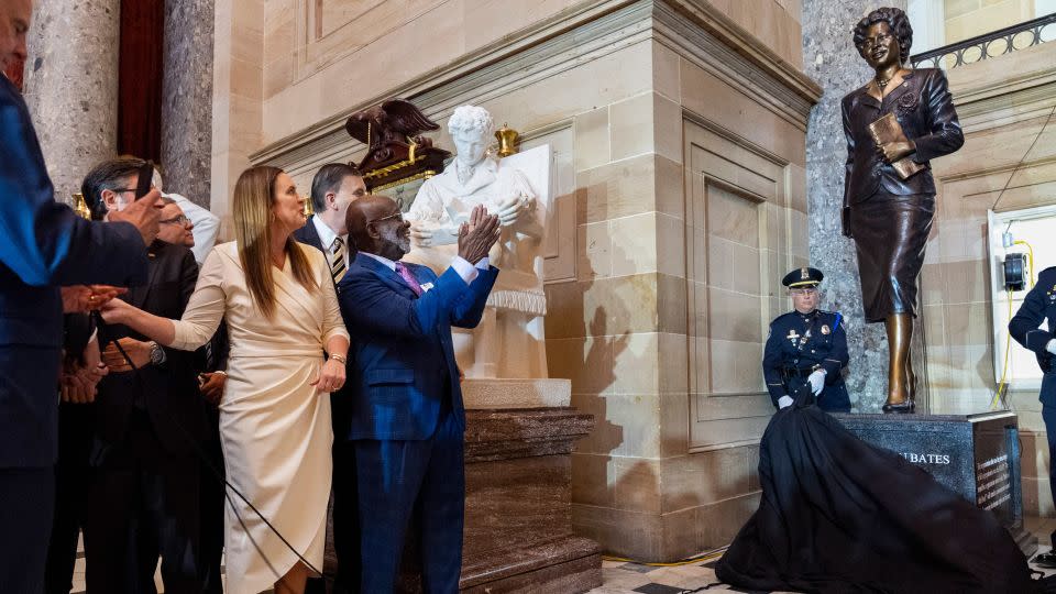 Arkansas Gov. Sarah Huckabee Sanders, left, and Charles King, president of the Daisy Bates House Museum Foundation board, at the unveiling of a statue of civil rights leader Daisy Bates, of Arkansas, Wednesday, May 8, 2024, at Statuary Hall on Capitol Hill in Washington. - Jacquelyn Martin/AP