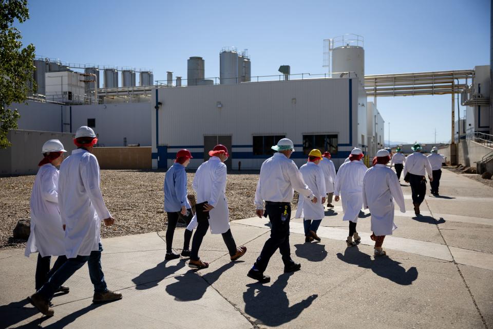 Lawmakers, local officials and staff members tour the Danone North America facility in West Jordan on Thursday, Sept. 7, 2023. | Spenser Heaps, Deseret News