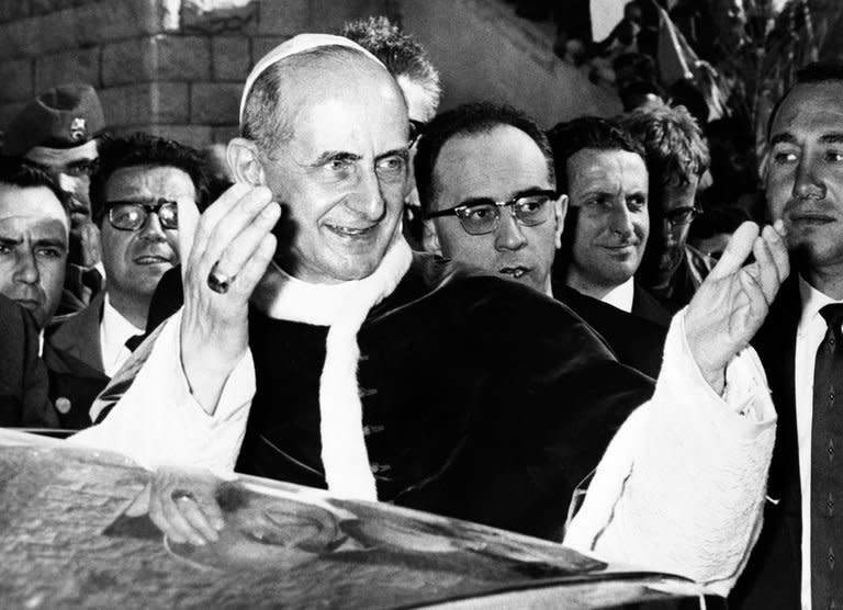 Pope Paul VI leaves the Basilica of the Annunciation in Nazareth after celebrating a mass on January 5, 1964 during his visit to the Holy Land. Pope Benedict XVI signed a decree on Thursday recognising the "heroic virtues" of late pope Paul VI, putting him on the first step towards beatification and eventual sainthood