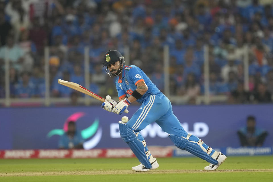 India's Virat Kohli plays a shot during the ICC Men's Cricket World Cup match between India and Pakistan in Ahmedabad, India, Saturday, Oct. 14, 2023.(AP Photo/Rajanish Kakade)