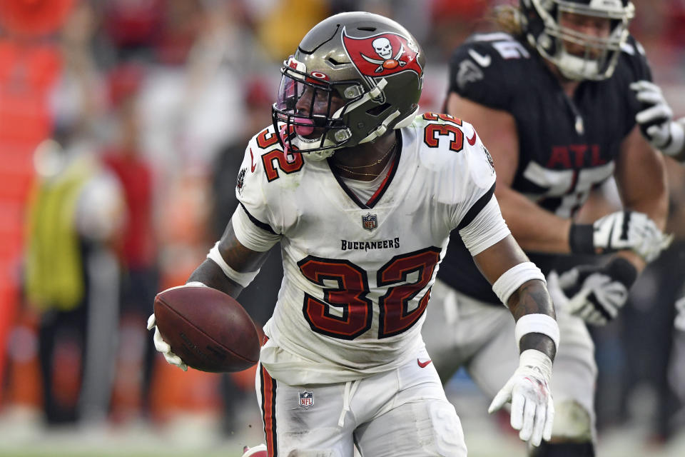 Tampa Bay Buccaneers safety Mike Edwards (32) looks back after intercepting a pass by Atlanta Falcons quarterback Matt Ryan (2) and returning it for a score during the second half of an NFL football game Sunday, Sept. 19, 2021, in Tampa, Fla. (AP Photo/Jason Behnken)