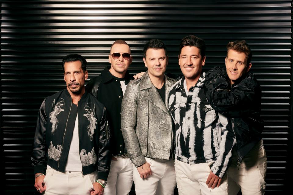 New Kids on the Block (from left: Danny Wood, Donnie Wahlberg, Jordan Knight, Jonathan Knight, Joey McIntyre) will tour with Paula Abdul and DJ Jazzy Jeff in 2024.