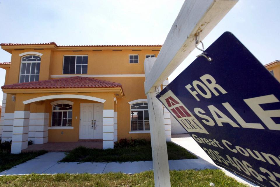 A 'For Sale' sign sits in front of a new home in Florida. The housing market, with a limited supply of homes for sale, has made it a challenging time to be a Realtor, despite escalating prices. (Getty Images)