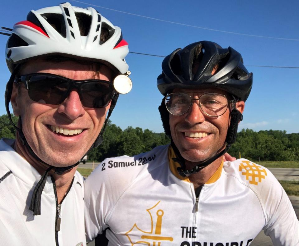 Kevin McNulty, left, a fellow teacher at Penn High School, caught up with and rode a bit with Les Crooks on the Race Across America.