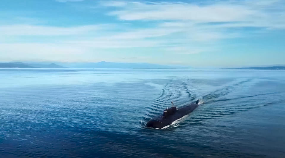 In this handout photo taken from video released by Russian Defense Ministry Press Service on Friday, April 14, 2023, a Russian nuclear submarine sails off to take part in the Pacific Fleet drills near Vladivostok, Russia. Russian Defense Minister Sergei Shoigu announced that the entire Russian Pacific Fleet was put on high alert on Friday for snap drills that will involve practice missile launches in a massive show of force amid the tensions with the West over the fighting in Ukraine. (Russian Defense Ministry Press Service via AP)